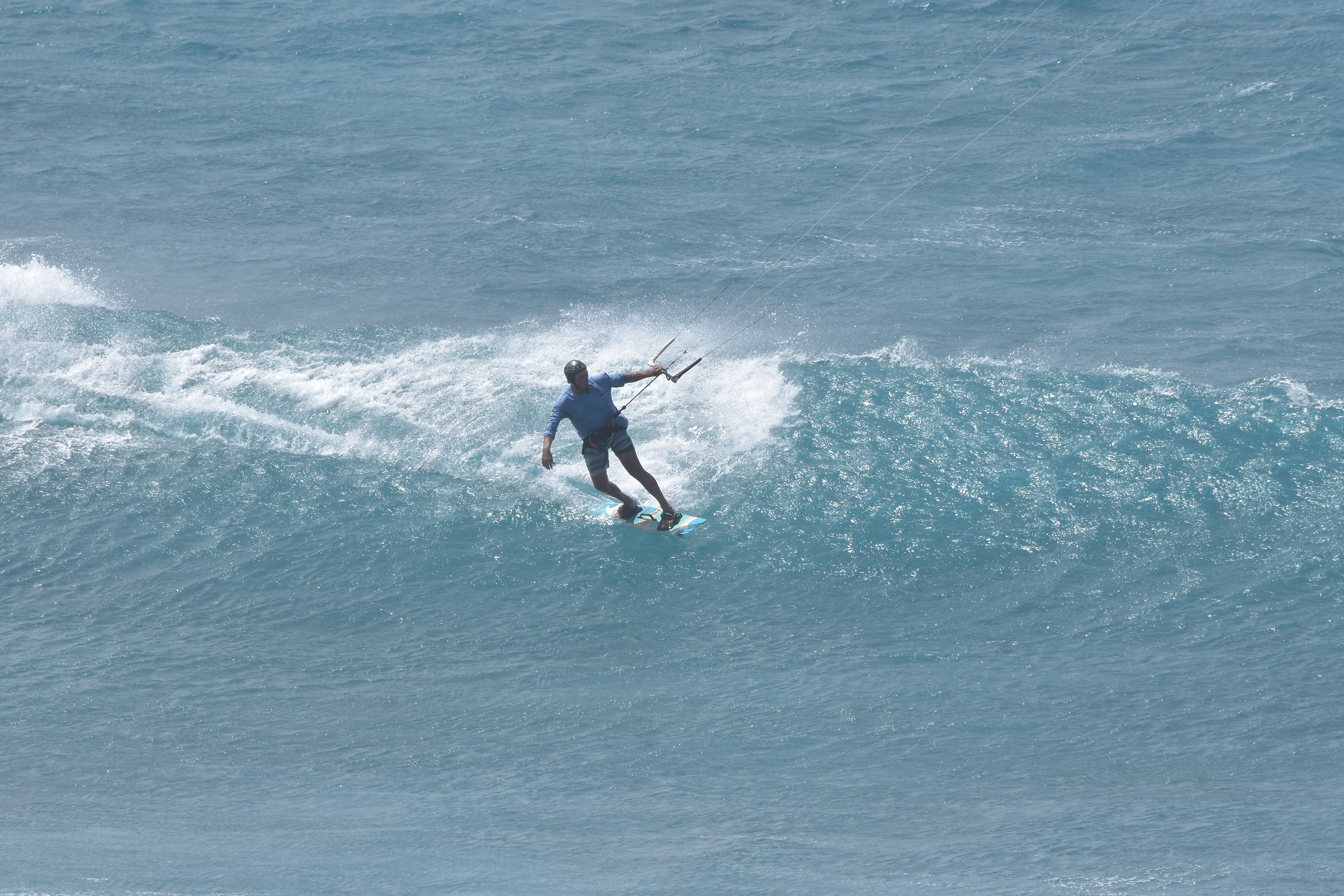 Phillip Money surfing on the sea