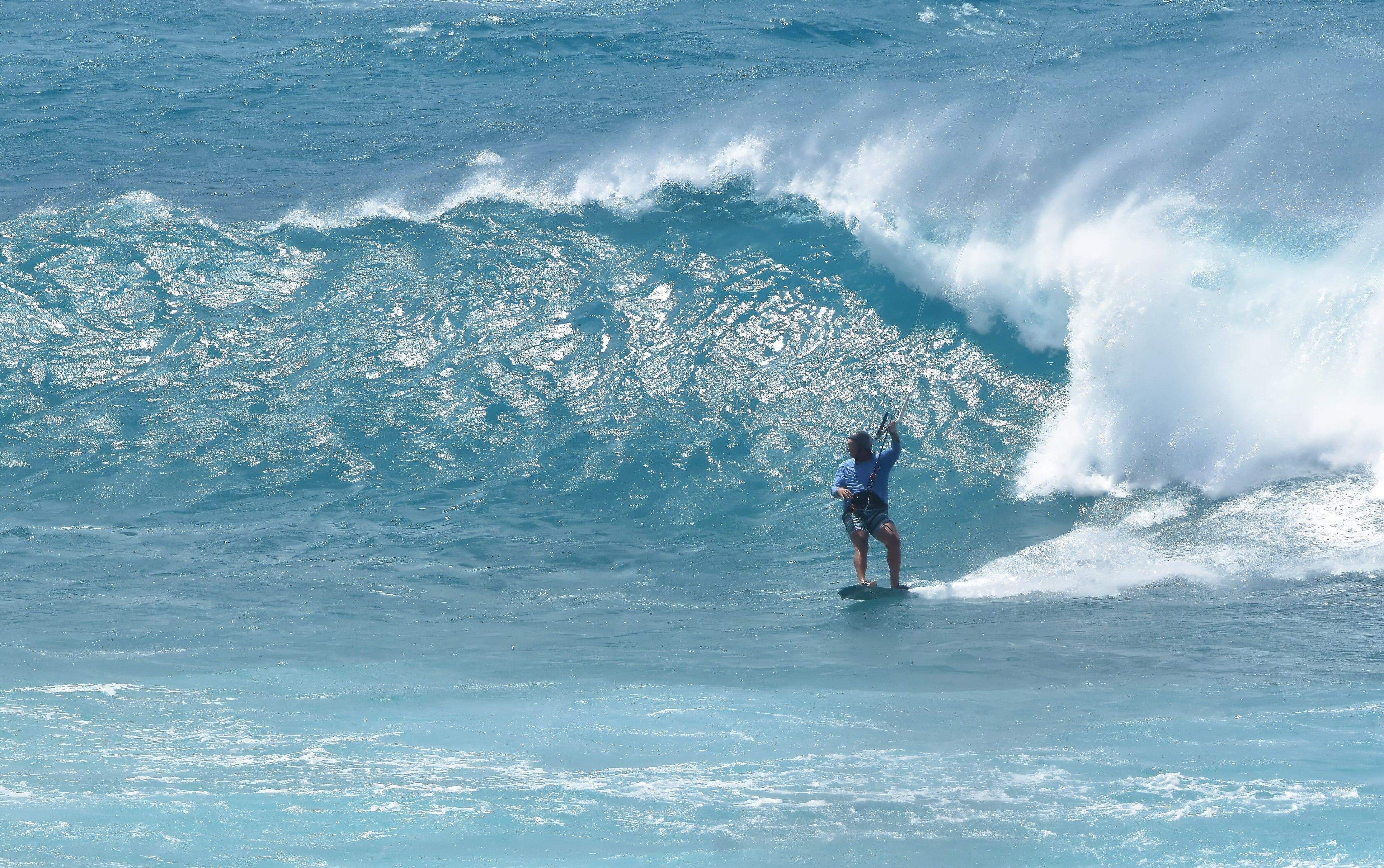 Phillip Money surfing on the sea